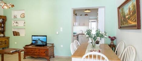 Superior Apartment, 2 Bedrooms, Patio | Living area | 40-inch flat-screen TV with digital channels