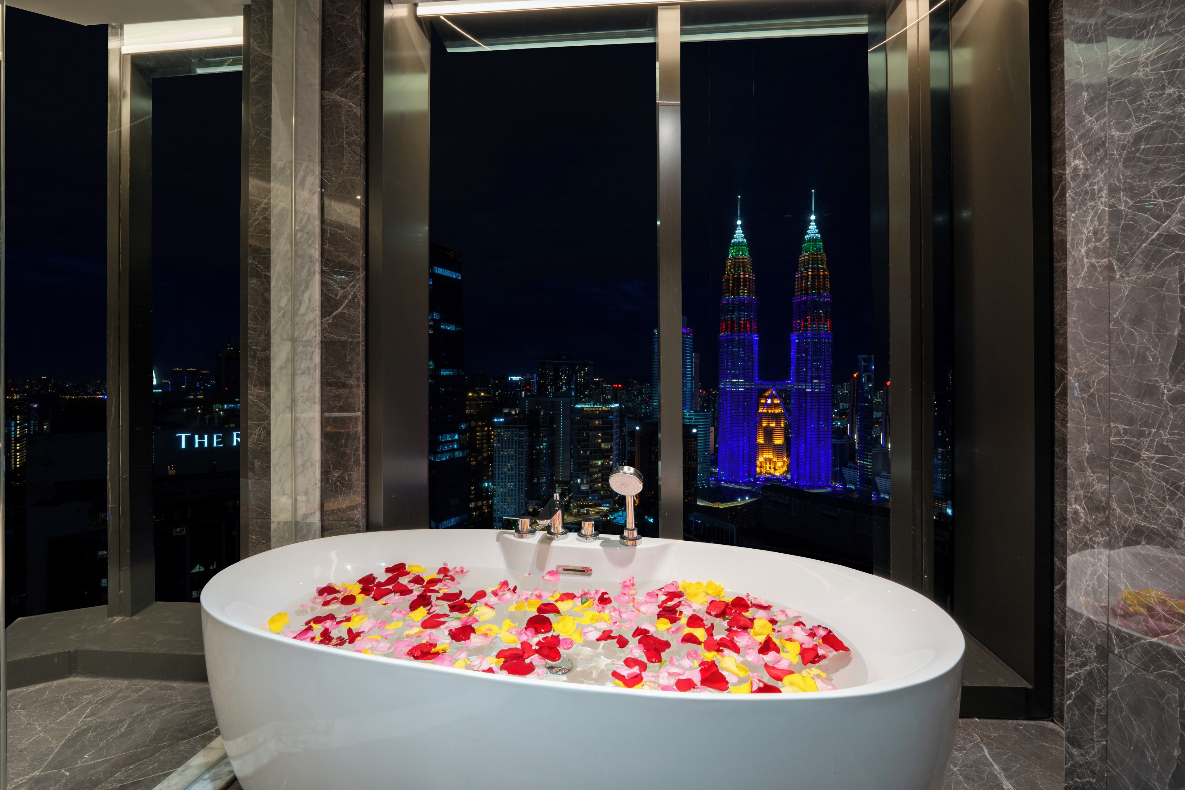 Panoramic Two Bedroom Suite Petronas Twin Towers View | Bathroom | Separate tub and shower, rainfall showerhead, designer toiletries