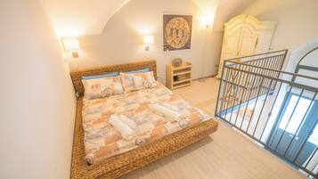 1 bedroom, premium bedding, down comforters, blackout drapes