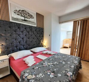 2 slaapkamers, een strijkplank/strijkijzer, gratis wifi, beddengoed