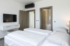 4 camere, una scrivania, ferro/asse da stiro, Wi-Fi gratuito