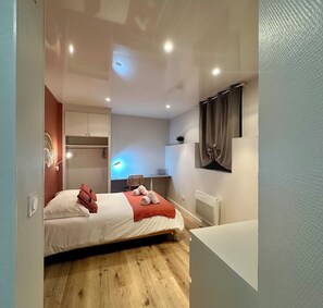 1 غرفة نوم ومكواة/لوح كي وواي فاي وملاءات أسرّة