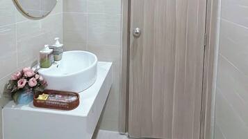 Hair dryer, slippers, towels, soap