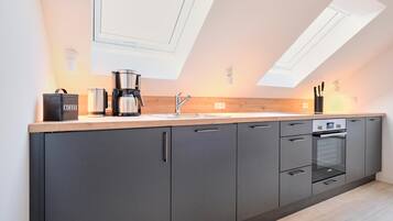 Réfrigérateur, four, plaque de cuisson, lave-vaisselle