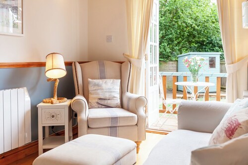 Dog-friendly cottage in charming village, with country walks and close to coast