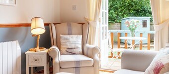 Dog-friendly cottage in charming village, with country walks and close to coast