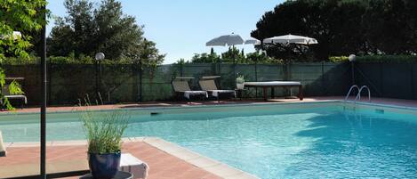 Seasonal outdoor pool, pool umbrellas, sun loungers