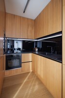 Superior Apartment | Private kitchen | Full-size fridge, microwave, oven, stovetop