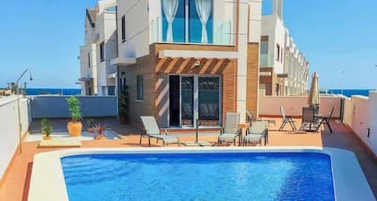 Beach villa with panoramic sea and mountain views