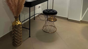 Suite Deluxe | 1 makuuhuone, ylelliset vuodevaatteet, untuvapeitot