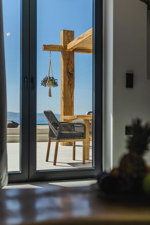 Storge Villa, Private Pool | Living area | 32-inch Smart TV with satellite channels, fireplace - La Grande Vue Private Villas (Naxos)