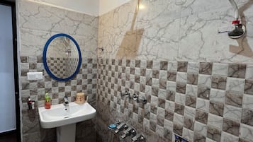 Shower, towels, soap, shampoo