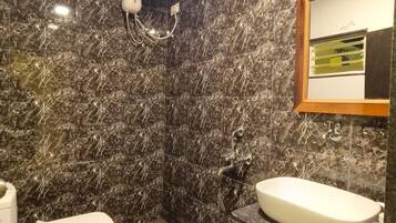 Shower, free toiletries, towels, soap