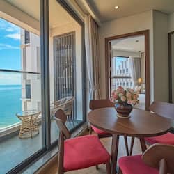 Junior Apartment, 2 Bedrooms, Sea View | Living area | 65-inch Smart TV with cable channels