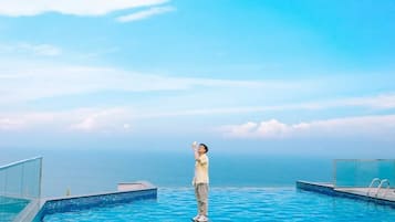 5 outdoor pools, open 6:00 AM to 8:00 PM, pool umbrellas, pool loungers