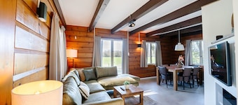 Atmospheric Canadian Lodge located by meadow