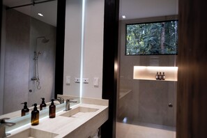 Shower, hair dryer, towels, soap
