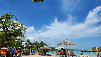 On the beach, beach towels