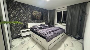 2 slaapkamers, een strijkplank/strijkijzer, wifi, beddengoed