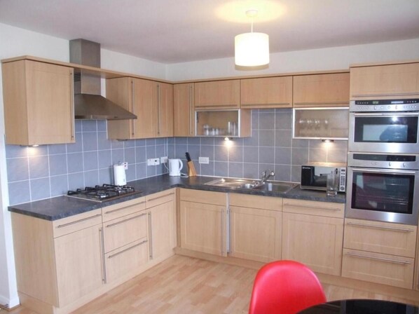 Apartment | Private kitchen | Fridge, microwave, oven, stovetop