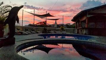 Outdoor pool, pool umbrellas, sun loungers