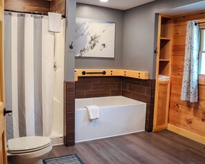 Jetted tub, hair dryer, towels, soap