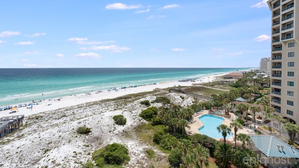 A beach resort with a pool, beach, and ocean view. - VillaSolare-Sandestin: 9th-Floor Gulf-Front+Views (Miramar Beach)