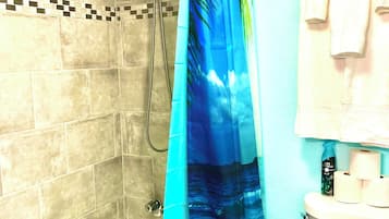 Separate bathtub and shower, free toiletries, hair dryer, towels