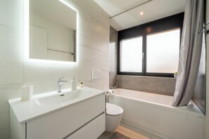 Hair dryer, towels, soap, shampoo