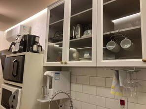 Familjelägenhet - flera sängar - balkong - utsikt mot staden | Eget kök | Kylskåp, mikrovågsugn, ugn och spishäll