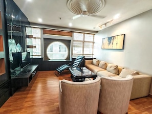 Apartment, City View | Living area | 40-inch LED TV with digital channels