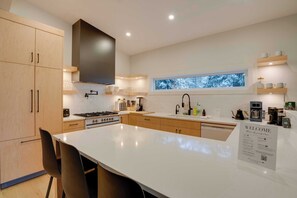 Fridge, microwave, oven, stovetop - Brand new 4 bed/3 bath duplex w/ private hot tub, laundry, amazing views! (Silver Star Mountain)