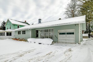 A two-story house with a garage, covered in snow. - 4 Mi to Dtwn: Pet-Friendly Home in Utica (Utica)