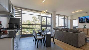 Comfort Apartment, 1 Bedroom, Balcony, City View | Dining room