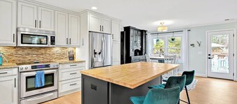 4 bedroom 3 bath with tranquil saltwater pool oasis!  Sleeps up to 12