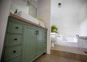 Shower, towels, soap, toilet paper