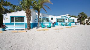A building with a sign reading "Mermaid Tales" and numbered 231. - MT Wind Swept #5 (Fort Myers Beach)
