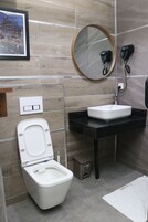 Hair dryer, towels, soap, shampoo