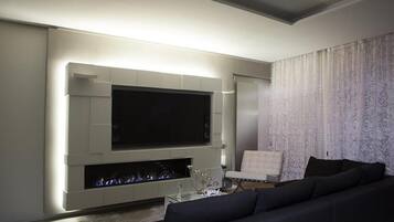 Apartemen Mewah, pemandangan kota | Area keluarga | TV