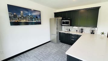 Fridge, microwave, coffee/tea maker, toaster