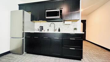 Fridge, microwave, coffee/tea maker, toaster