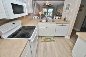 Condo, 1 King Bed with Sofa bed (Point East 213) | Private kitchen