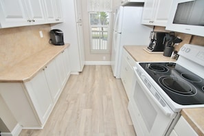 Condo, 1 King Bed with Sofa bed (Point East 213) | Private kitchen | Oven, toaster