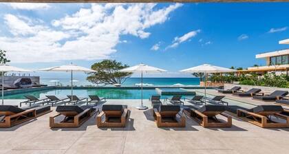 First floor, private pool, gym, beach club, maid service