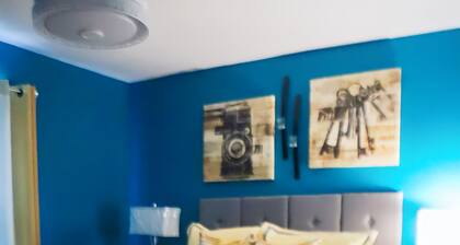 Cozy 3-bedroom home in Kansas City with WiFi, AC, and a private backyard.