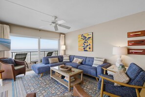 Condo, Multiple Beds (Schooner Point A204) | Living area | TV - Schooner Point A204 (New Smyrna Beach)