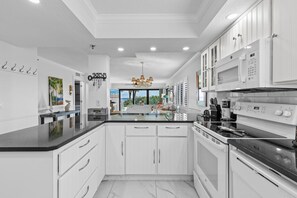 Condo, Multiple Beds (Shorehom by the Sea 14) | Private kitchen | Oven, coffee/tea maker, toaster, blender - Shorehom by the Sea 14 (New Smyrna Beach)