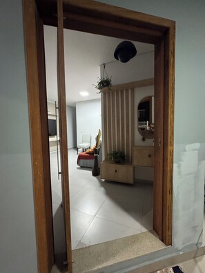 Family Apartment, Non Smoking, Courtyard View | Living area | TV - Prado Guest House (Florianópolis)