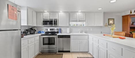 Condo, 1 King Bed (Seaward B103) | Private kitchen | Oven, toaster
