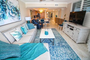 Condo, Multiple Beds (Ebb Tide 203) | Living area | TV - Ebb Tide 203 (New Smyrna Beach)